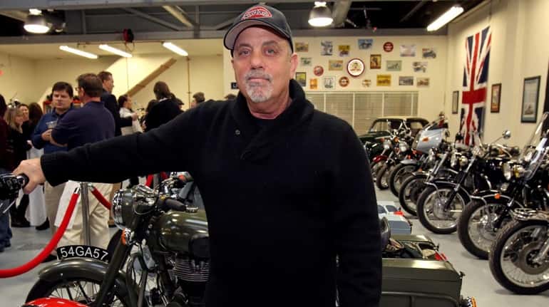 Billy Joel in his Oyster Bay motorcycle shop 20th Century...