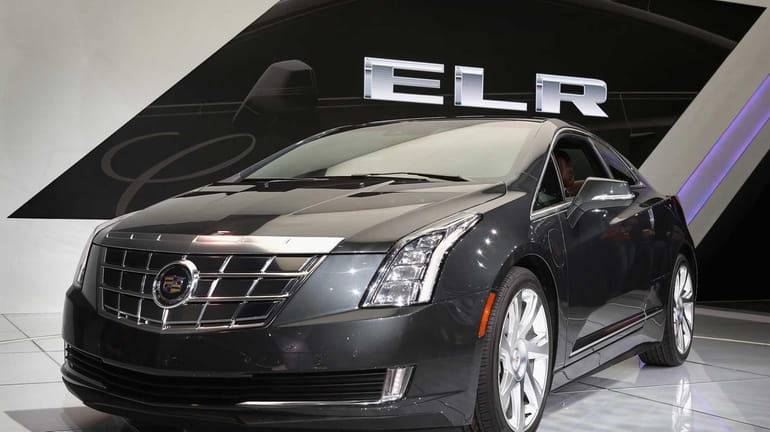 Cadillac shows off its ELR extended-range luxury hybrid during the...
