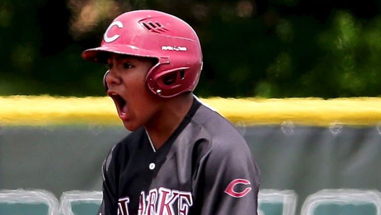 Clarke's JJ Palumbo reacts after driving in two runs to give...