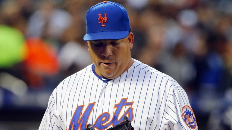 Bartolo Colon #40 of the New York Mets looks at...