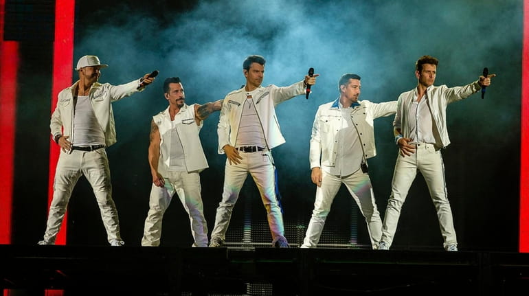 New Kids on the Block members Donnie Wahlberg, Danny Wood,...
