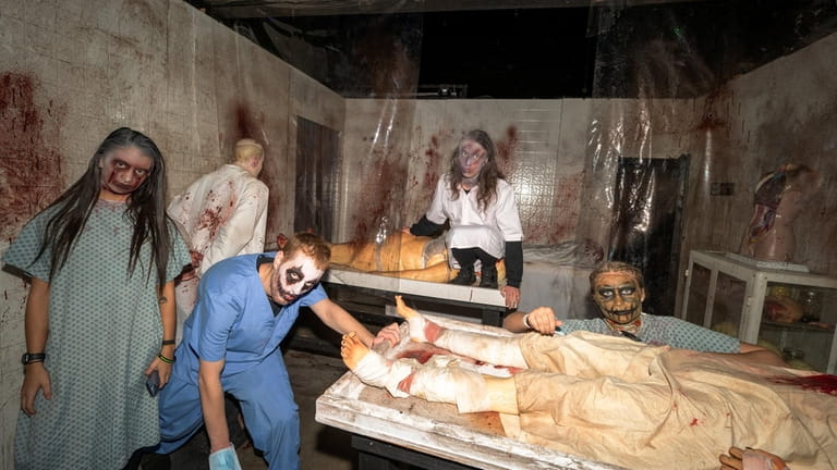 The scare actors in The Asylum attraction at Bayville Scream...