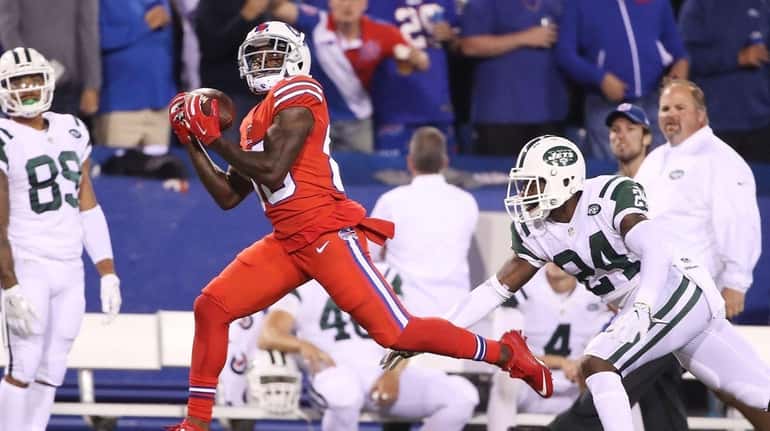 Buffalo's Marquise Goodwin gets behind Darrelle Revis for an 84-yard...