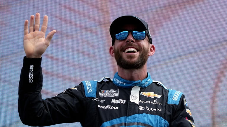 Ross Chastain waves during introductions before a NASCAR Cup Series...