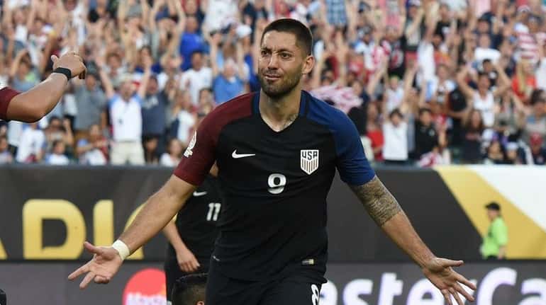 USA's Clint Dempsey celebrates after scoring against Paraguay during the...
