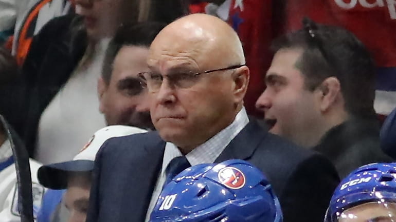 Islanders head coach Barry Trotz watches from the bench during...