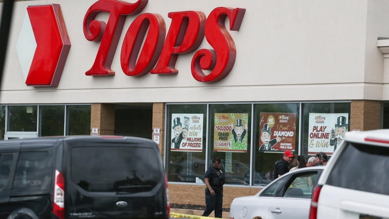 Police outside the Tops supermarket in Buffalo. In 2021, there...