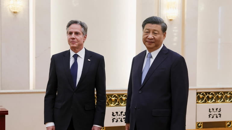 U.S. Secretary of State Antony Blinken, left, meets with Chinese...