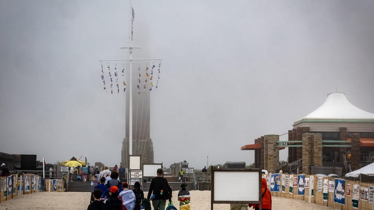 Visibility at Jones Beach was an issue Friday, leading organizers...