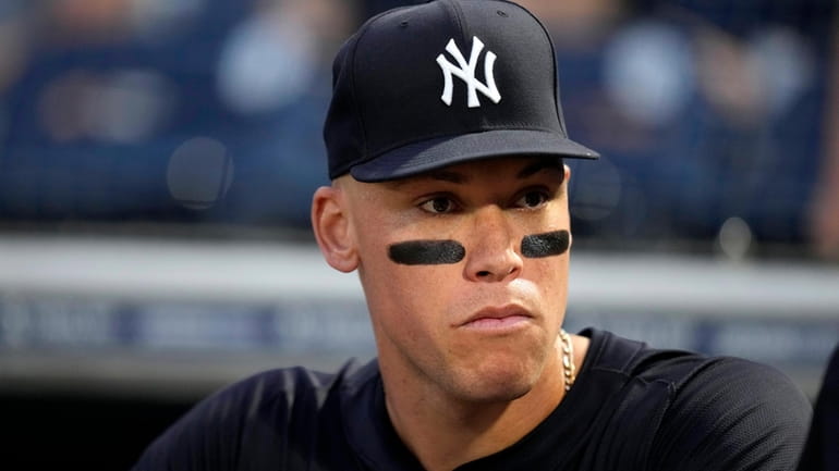 New York Yankees center fielder Aaron Judge stands in the...