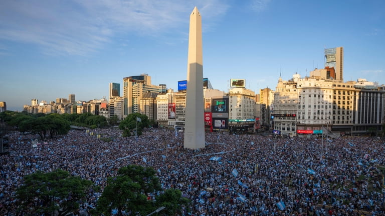 Argentina soccer fans celebrate their team's victory over Croatia in...