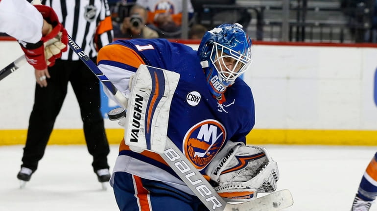 Thomas Greiss #1 of the New York Islanders makes a...