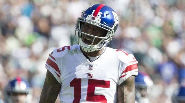 Giants wide receiver Brandon Marshall reacts during a game against...