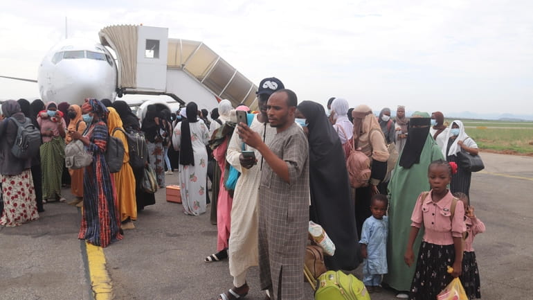 Nigerians who were evacuated from Sudan arrive at the Nnamdi...