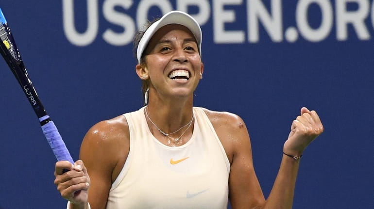 Madison Keys reacts after she wins her match against Carla...