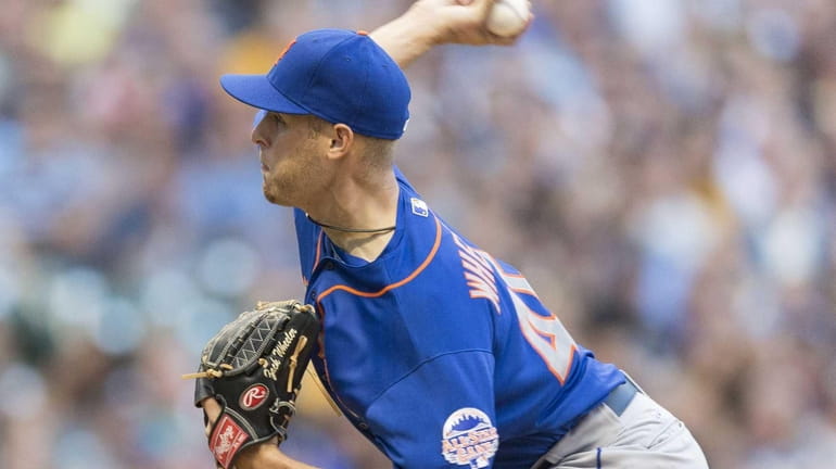 Zack Wheeler of the Mets pitches to a Milwaukee Brewers...