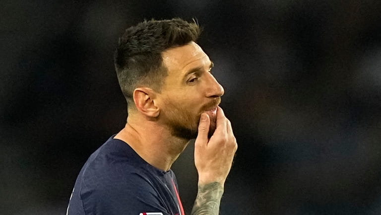 PSG's Lionel Messi reacts during the French League One soccer...