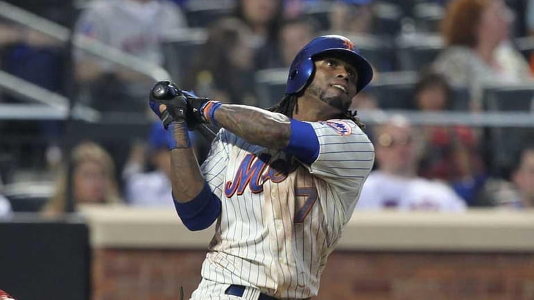 Jose Reyes (#7) of the New York Mets hits a...