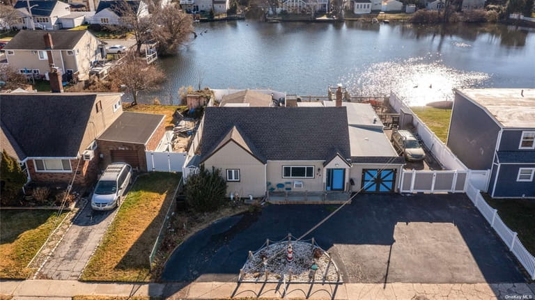 This $634,000 West Babylon home has four bedrooms.