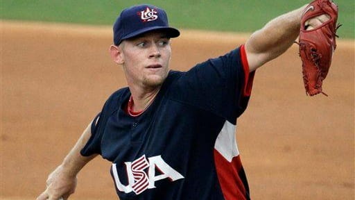 USA starting pitcher Stephen Strasburg throws during a game against...