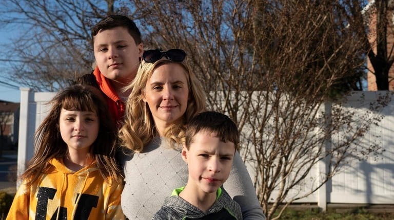 Christina Haubeil with her children, twins Corinne and Jacob Haubeil, 11,...