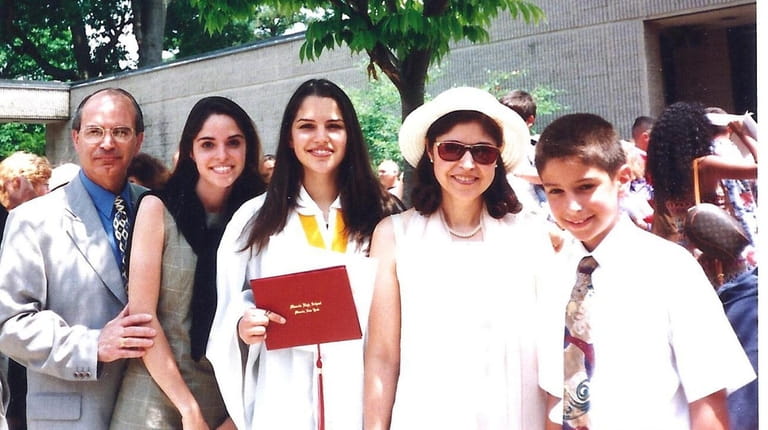 Diane Macedo with her family the day she graduated from...