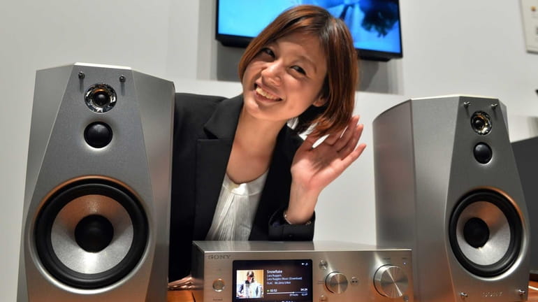 A model displays Japanese electronics giant Sony's harddisc audio player...