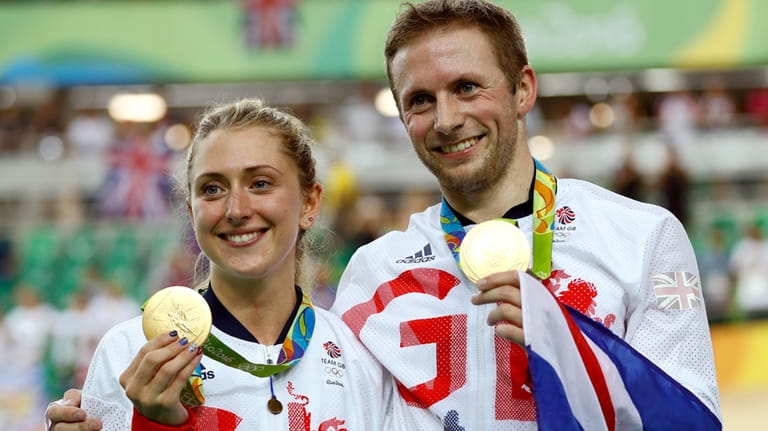Laura Trott, left, and her fiance Jason Kenny, right, both...