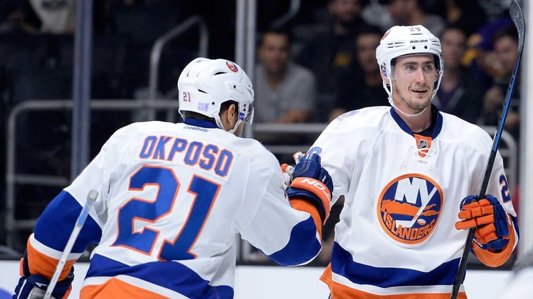 Brock Nelson of the Islanders celebrates his goal with Kyle...