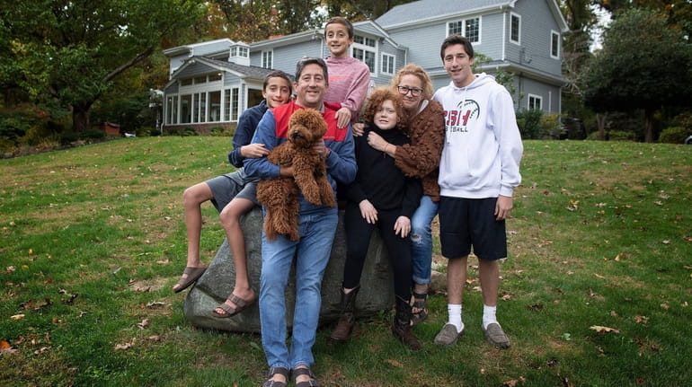 Bruce and Nicole Gerberg with four of their six children, from...