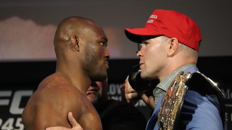 UFC welterweight champion Kamaru Usman and challenger Colby Covington face...