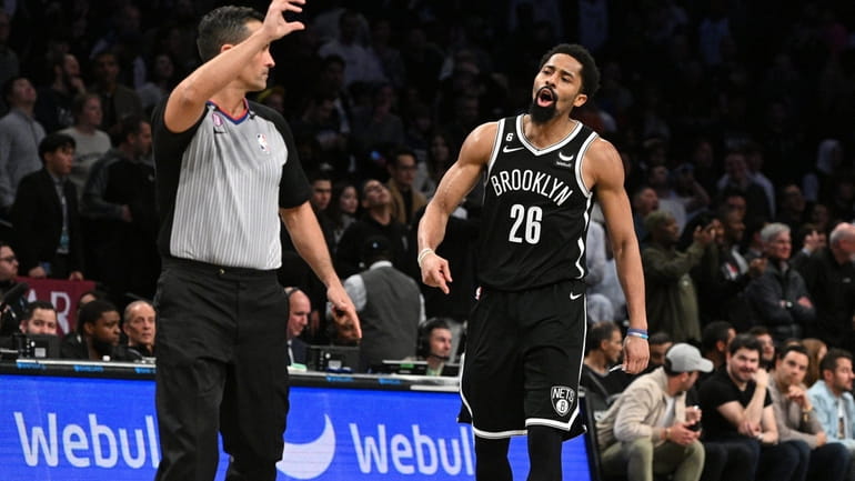 Brooklyn Nets guard Spencer Dinwiddie reacts to a referee late...