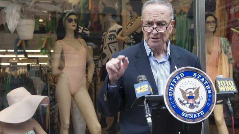 Sen. Chuck Schumer holds a news conference in front of...