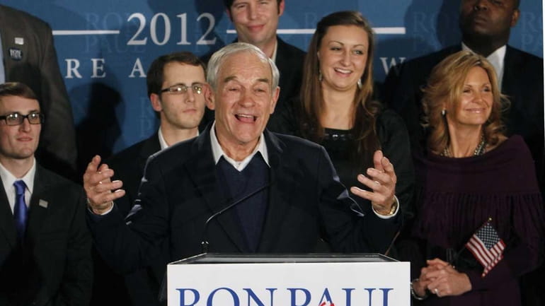 Republican presidential candidate, Rep. Ron Paul, R-Texas, speaks to supporters...