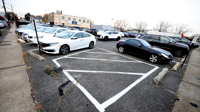 Oyster Bay wants to use eminent domain to seize the parking...
