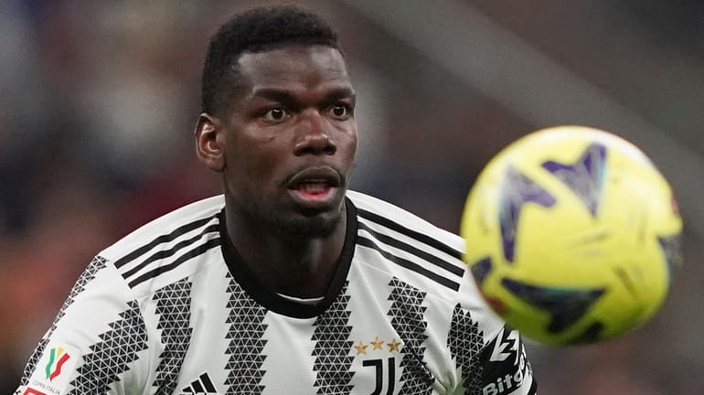 Juventus' Paul Pogba keeps his eyes on the ball during...