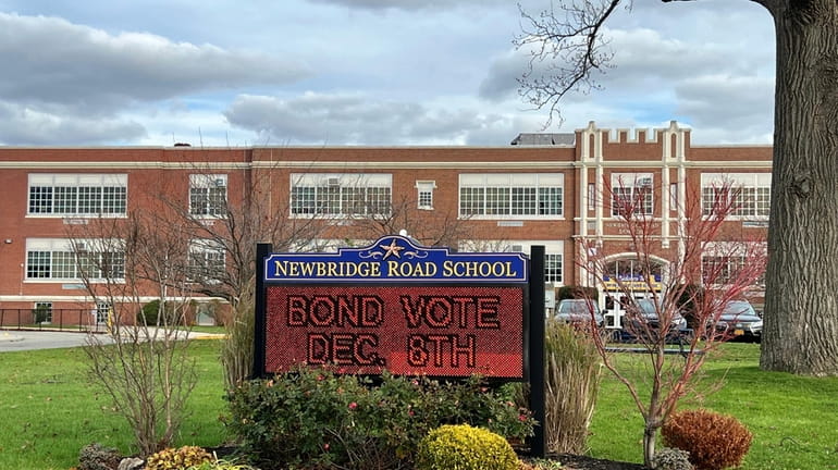 Voters in two Nassau County school districts, North Bellmore and Manhasset,...