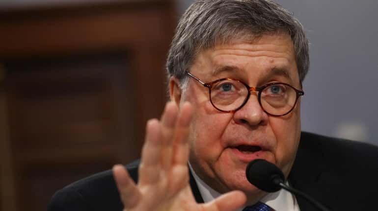 Attorney General William Barr defended his four-page summary of the...