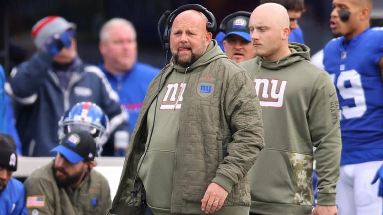 Giants head coach Brian Daboll looks on from the sideline against...