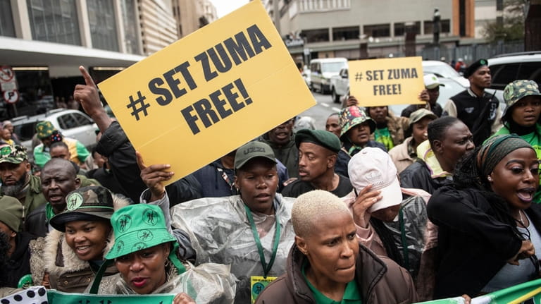 FILE — Supporters of former South African President Jacob Zuma...