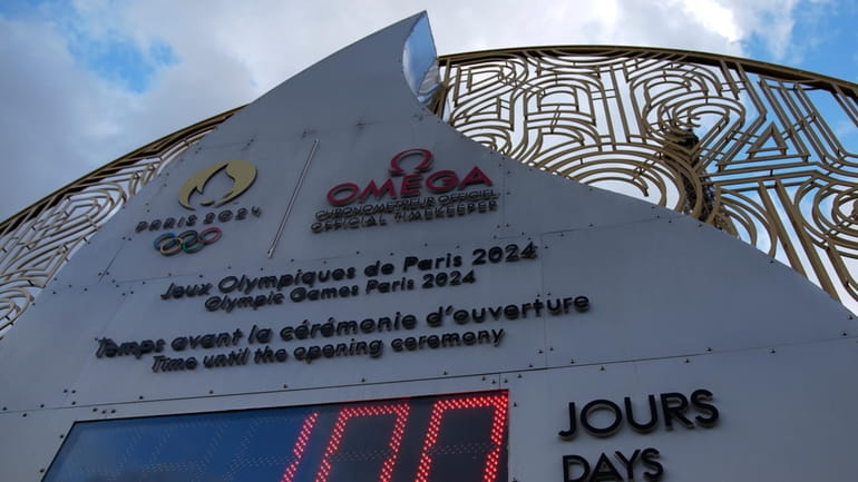 The countdown clock reads 100 days before the Paris 2024...