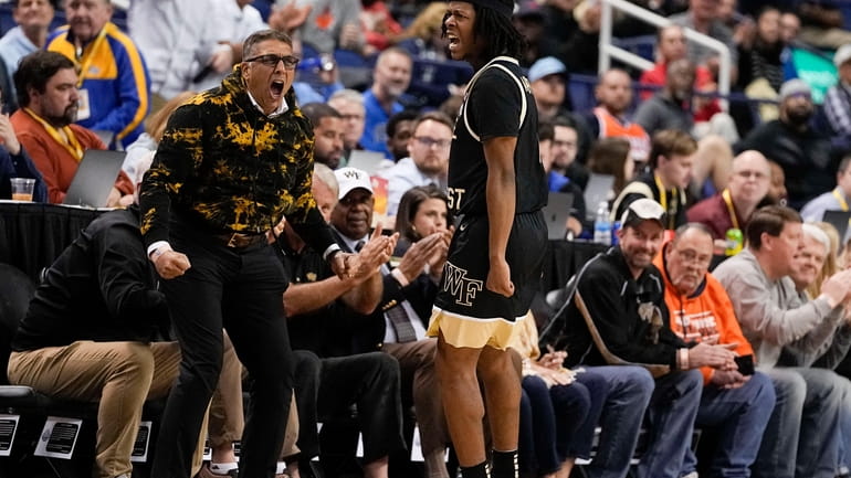 Wake Forest guard Tyree Appleby celebrates after scoring during the...