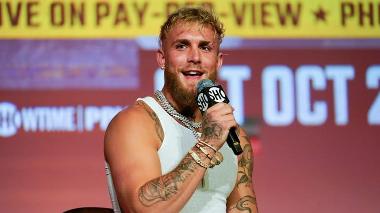 Jake Paul speaks during a news conference Monday, Sept. 12,...