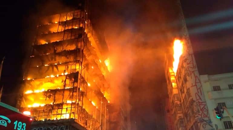 A building on fire is seen in Sao Paulo, Brazil,...