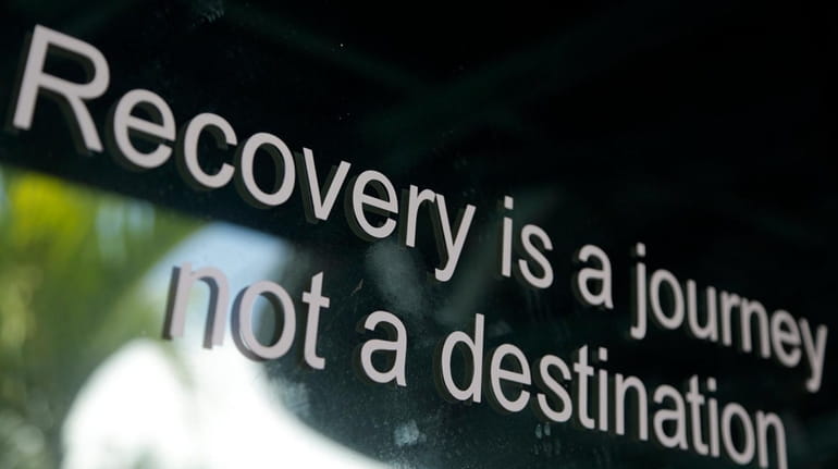 A slogan is on the storefront of Journey, a former...