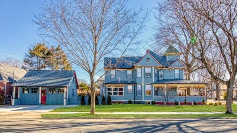 This 2,269-square-foot home has four bedrooms and a detached four-car garage..