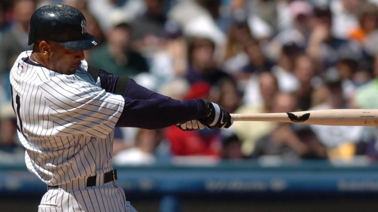 The Yankees' Gary Sheffield homers in the fourth inning against the...