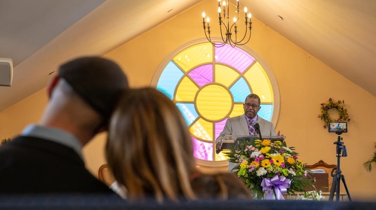The Rev. Saba Mchunguzi preaches on Easter Sunday at Unity...