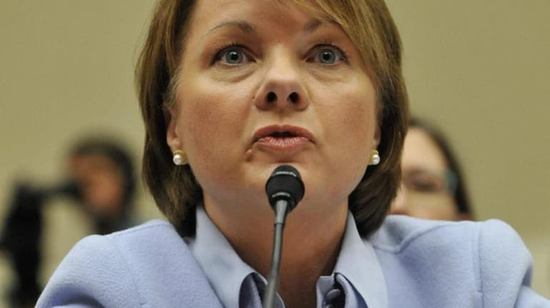 Angela Braly, chief executive of WellPoint Inc., testifies on her...