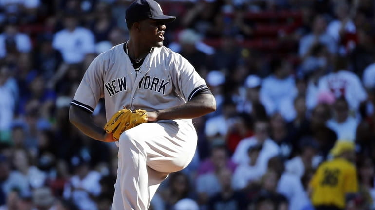 Yankees starting pitcher Michael Pineda delivers a pitch to the...